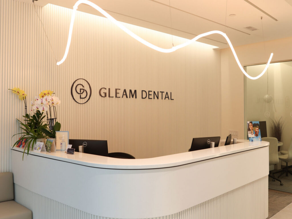 Gleam Dental clinic front desk area. Get directions, contact us for appointments.