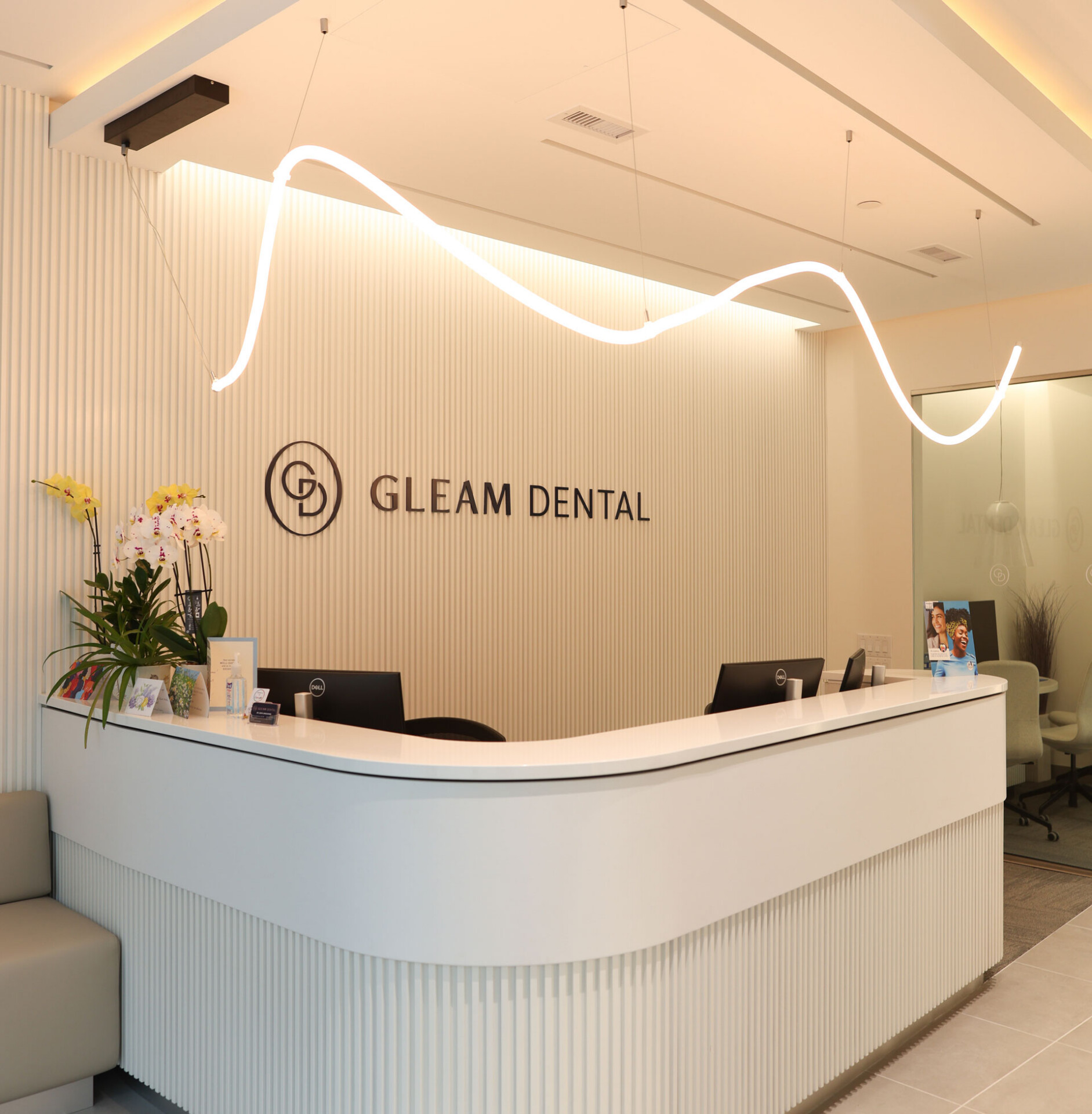 Gleam Dental clinic front desk area. Get directions, contact us for appointments.
