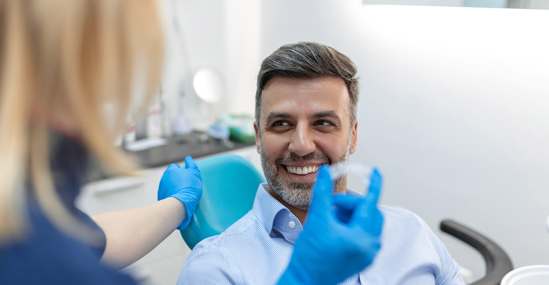 patient is educated by their dentist about invisalign