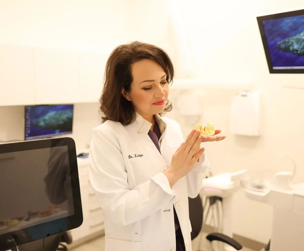 Dr Lidiya Zavalishina, founder and general dentist at GLEAM Dental, a Toronto dental clinic located at 430 Roncesvalles Ave Unit 109, Toronto, ON M6R 0A6