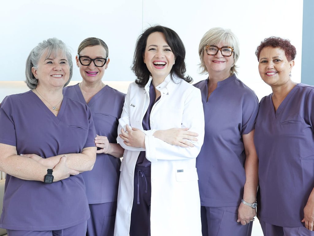 Dr Lidiya and her dental team at Gleam Dental, Toronto's premier dental clinic serving all ages.