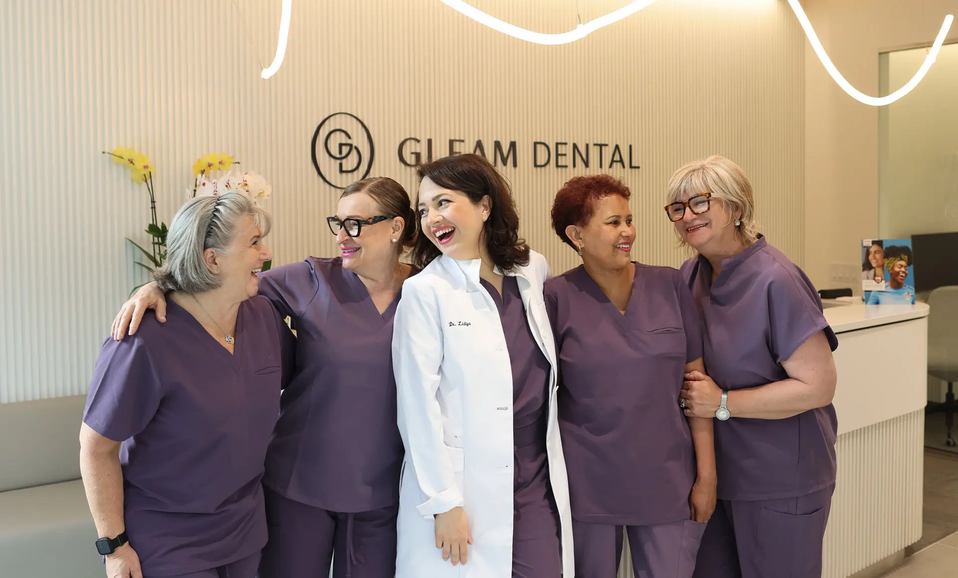 the GLEAM team - a photo of the founder with our compassionate, experienced staff