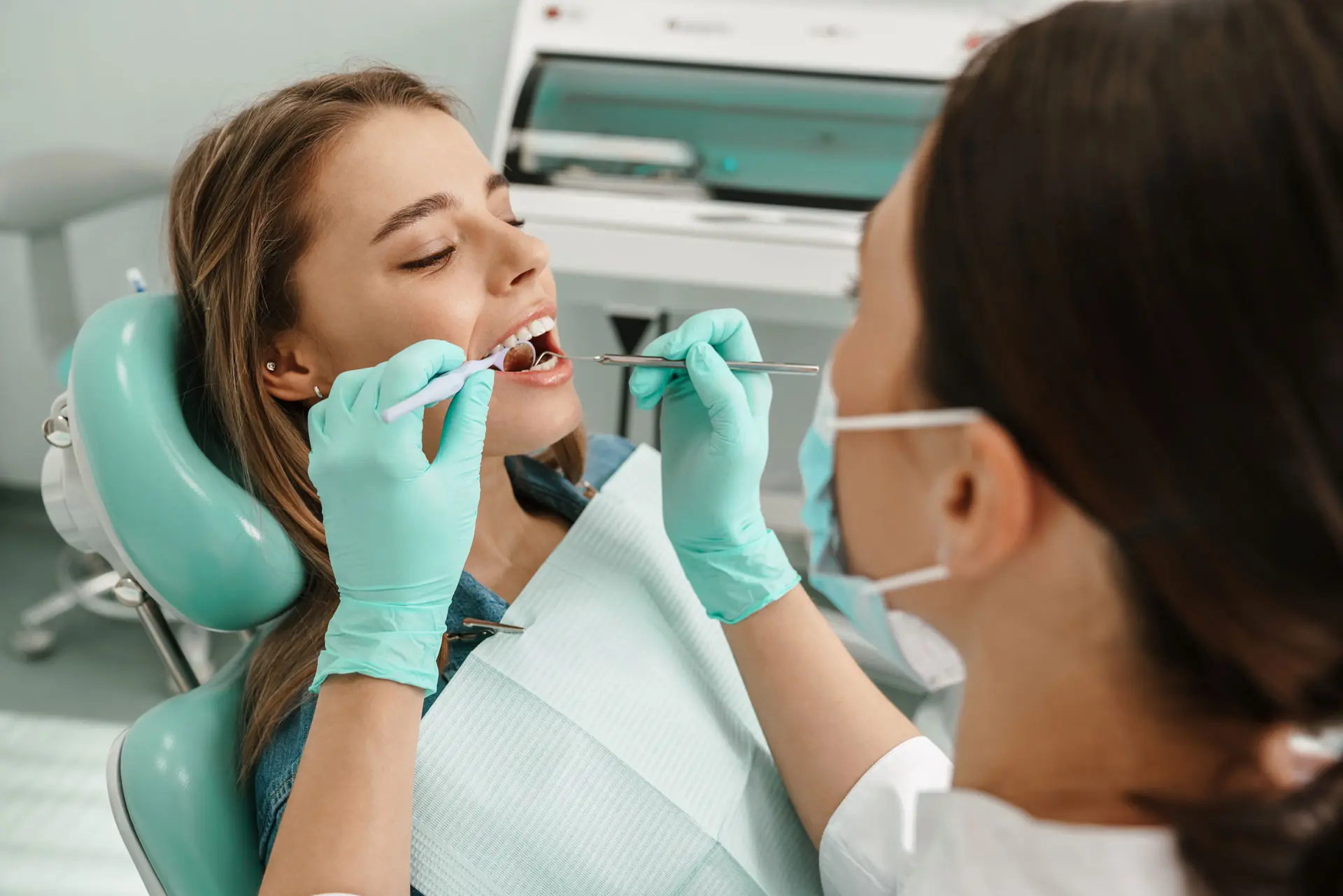 a new patient receiving a dental checkup