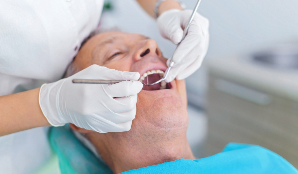 a man getting his annual dental checkup done